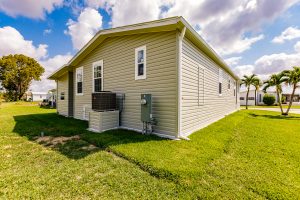 Back view of a house with a shed