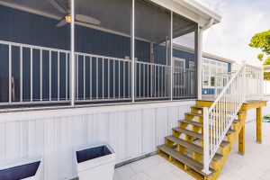 Angled view of a screen room and stairs