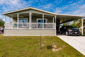 Front view of a patio with a carport
