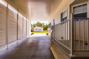 Close up of an enclosed carport and stairs