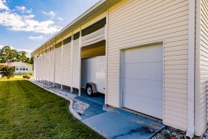 Side view of a small garage and enclosed carport