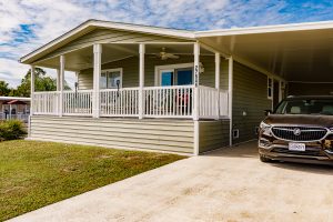 Angled view of a house with a carport