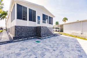Back view of a screened room with stairs