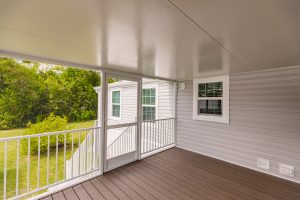 Inside view of a screen room with stairs