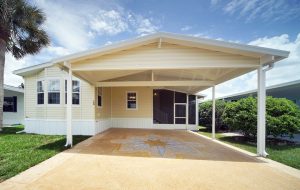 Front view of a carport and a screen room